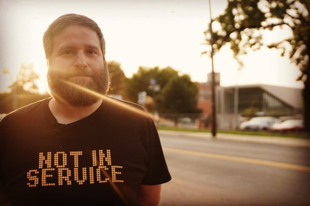Thomas Fucaloro wearing "Not In Service" T-shirt